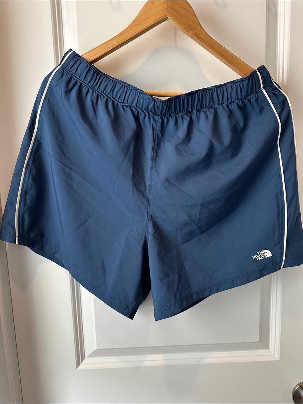 The North Face Blue Running Shorts with White Trim